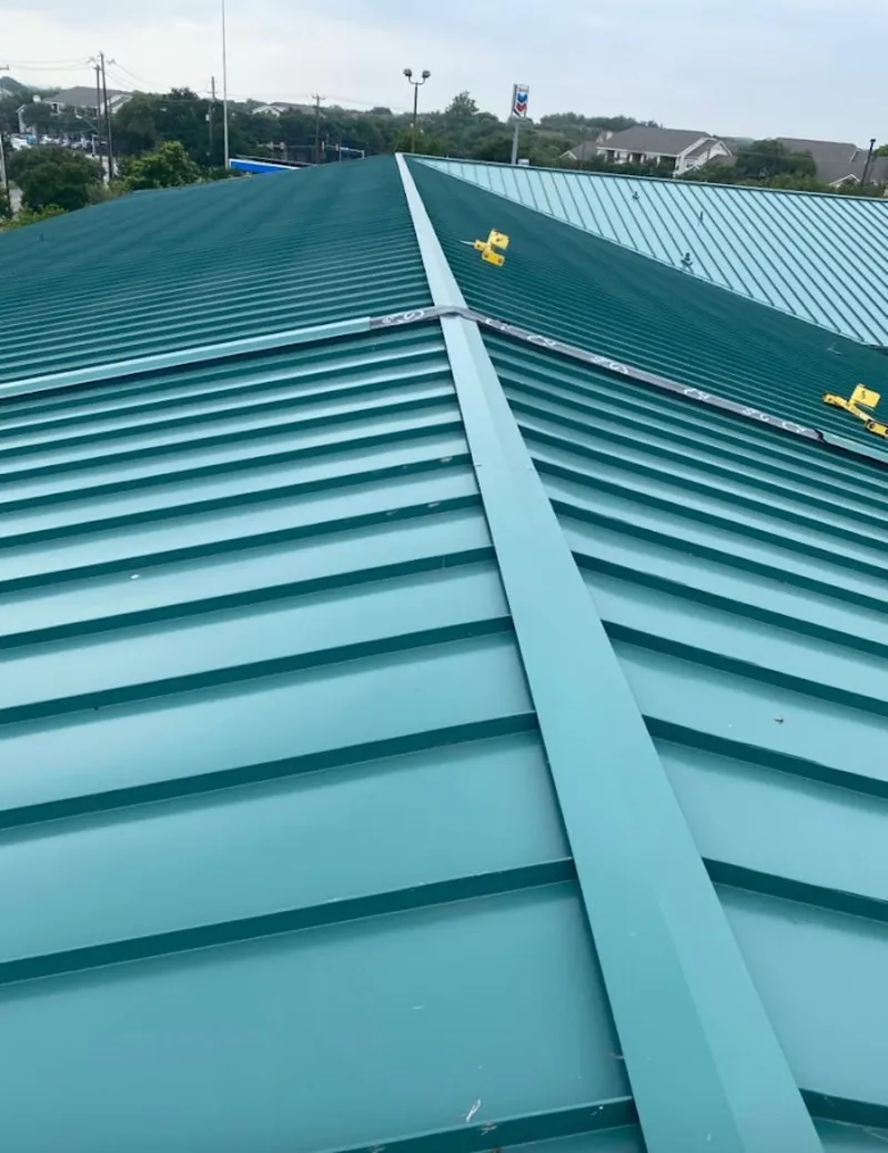 Green commercial metal roof ridge and valley for Metal Roof Repair in Carver