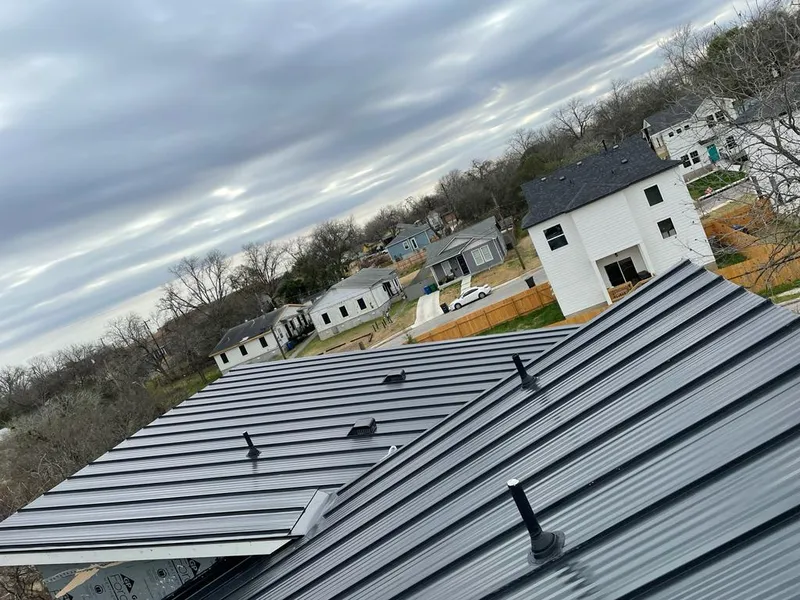 Standing seam metal roof panels with vents for Skylight Repair in Carver